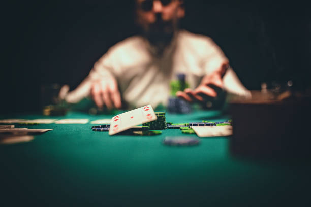 Man at card table in casino